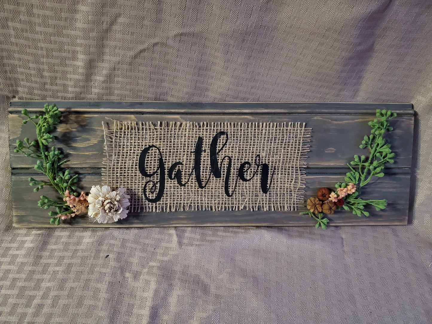 Unique handmade mixed media sign with burlap ribbon and delicate florals, "gather," gray washed wood with bead board texture.  This sign was designed as a part of our fall collection with its warm, muted color scheme and tiny pumpkins, but it could add character to your home all year round. 