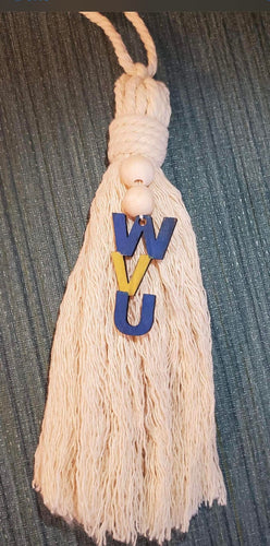 Design your own tassel with blue and gold beads and laser cut letters.