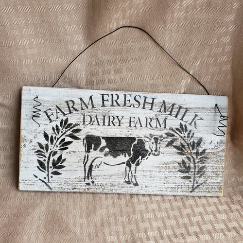 The Farm Fresh Milk Dairy Farm sign will make a delightful addition to your farmhouse kitchen with its happy little cow and florals. wire hanger adds another dimension versus regular picture hanger. Adorable small size 5