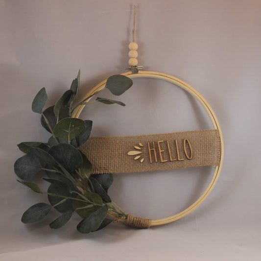 This charming, neutral wreath will brighten up any space in your home! 10.5" wide, wooden beads and letters, eucalyptus leaves, burlap ribbon