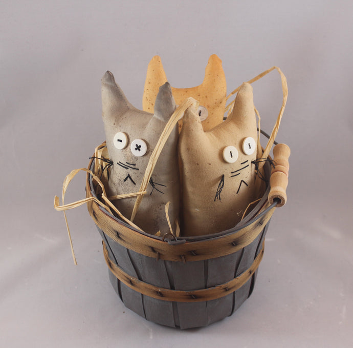These adorable cats live in a small, blue basket. Hand sewn, hand painted, charming, folk art style dolls.