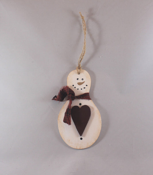 wooden hand painted snowman ornament with red fabric scarf holding heart