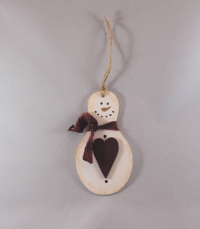 wooden hand painted snowman ornament with red fabric scarf holding heart