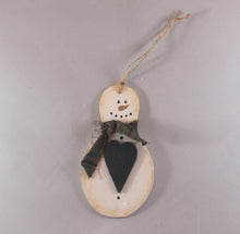 Load image into Gallery viewer, wooden hand painted snowman ornament with green fabric scarf holding heart
