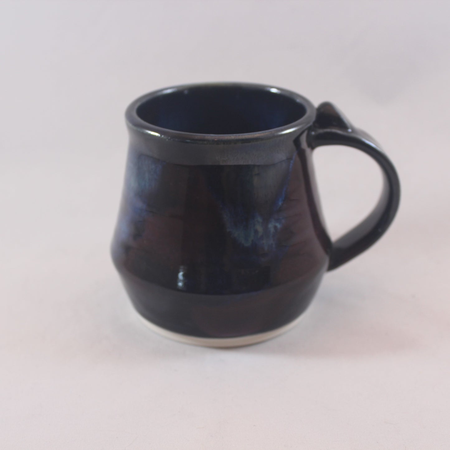 Porcelain mugs by C C Moon Pottery