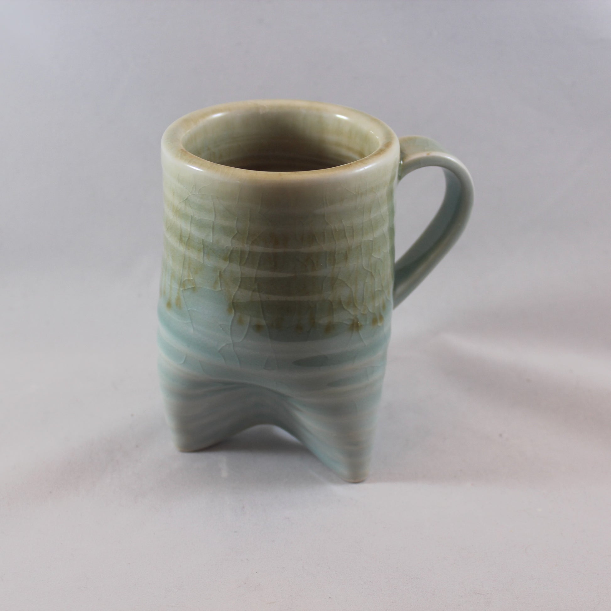 Porcelain mugs by C C Moon Pottery