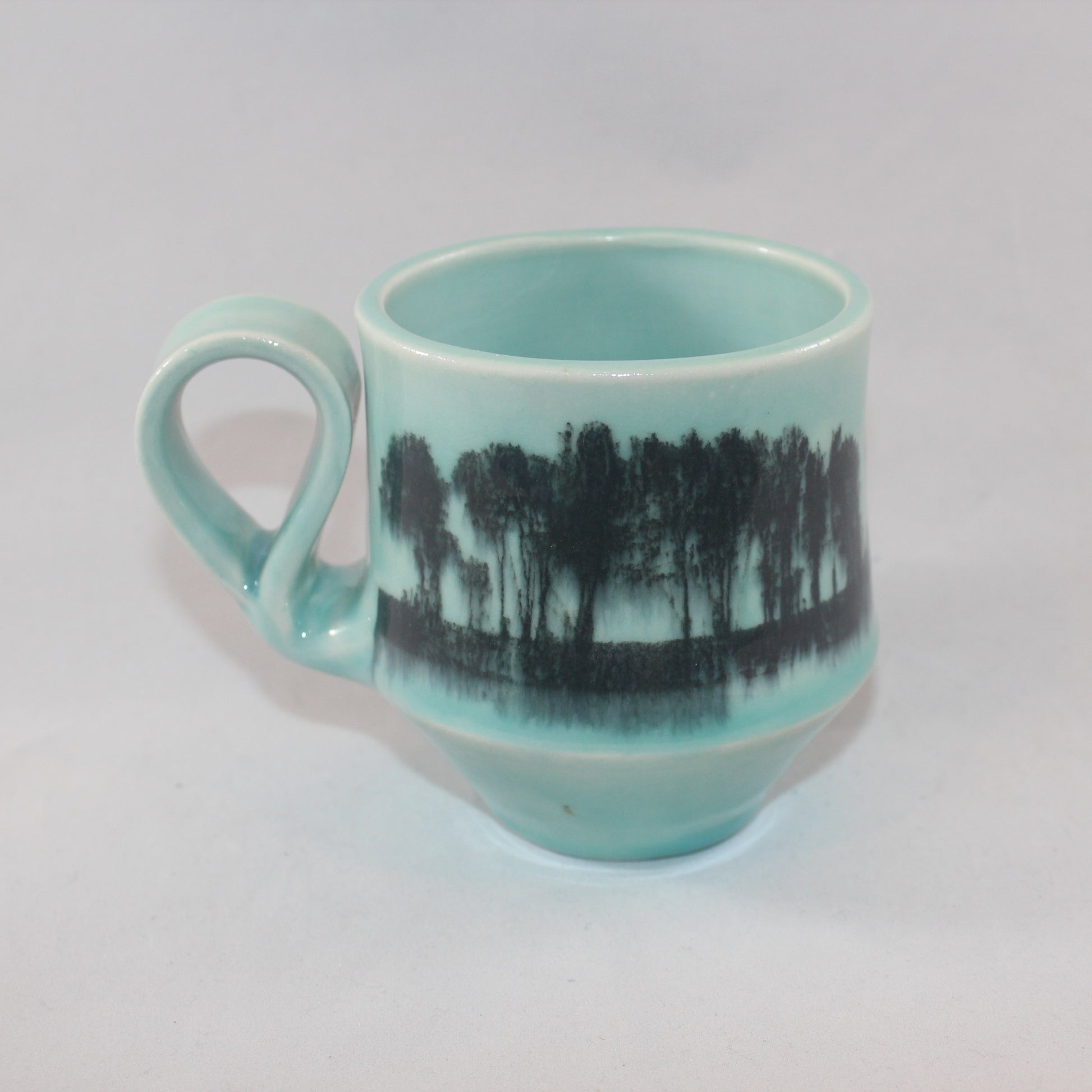 Porcelain mugs by C C Moon Pottery