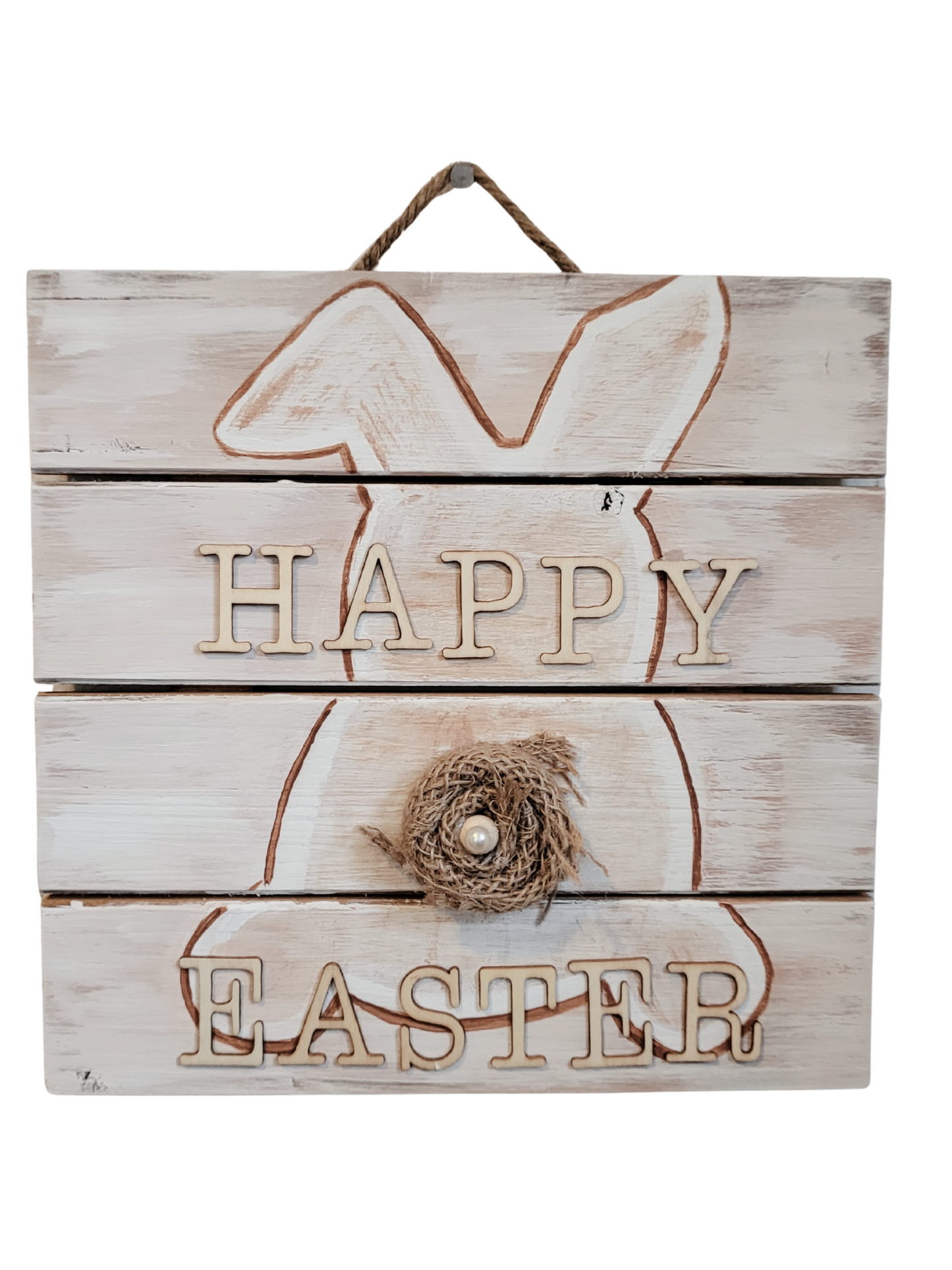 A sweet little pallet sign with laser cut letters "Happy Easter" and a bunny with a fluffy tail.