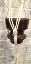 Load image into Gallery viewer, Macramé hanger with brown antique ceramic insulator.
