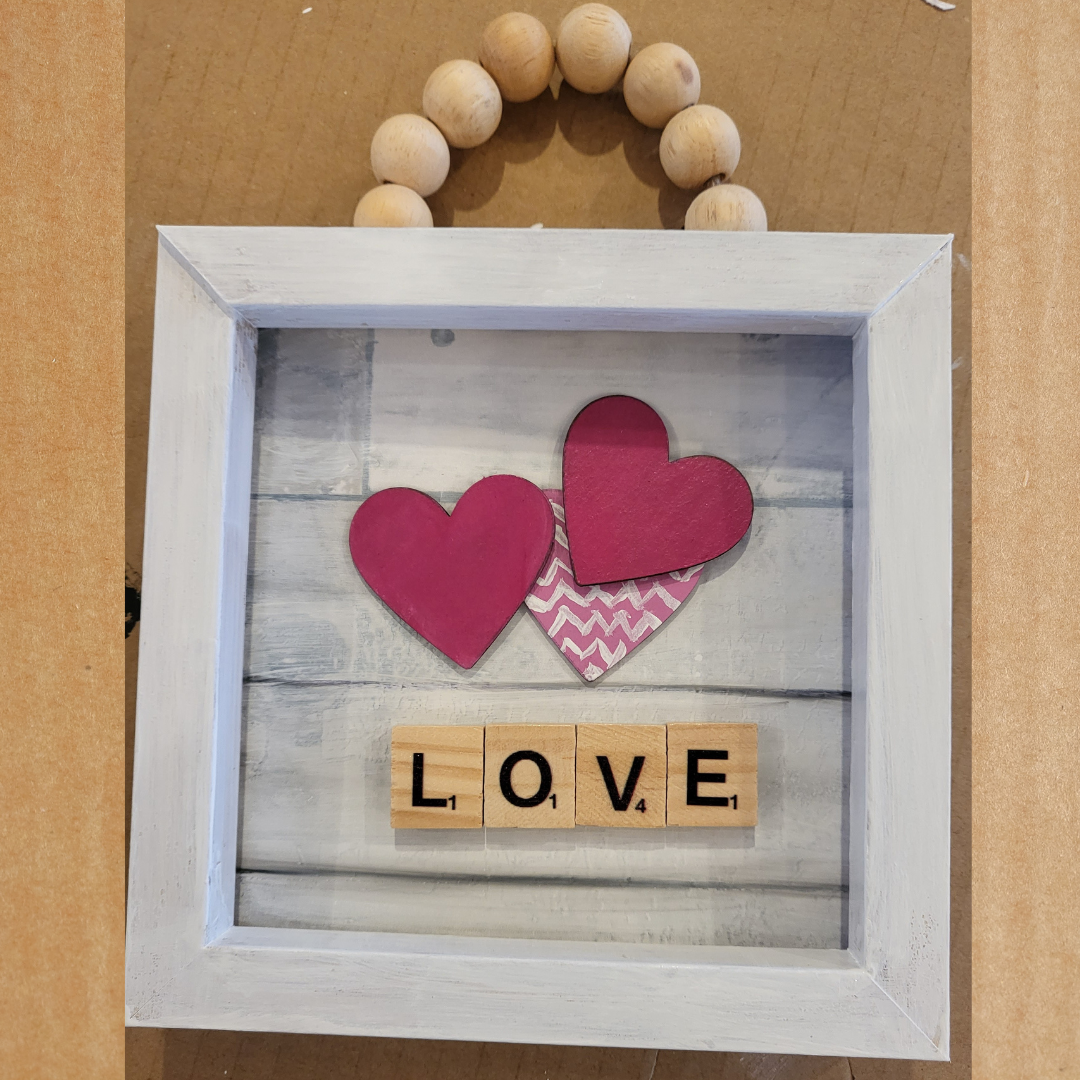 LOVE mini frame with beaded hanger. Sip n Paint party to design and decorate this mini frame with scrabble letter tiles that spell love with hearts. Beaded hanger on a 6x6" frame.