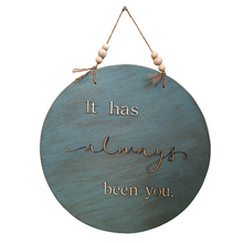 Load image into Gallery viewer, &quot;It has always been you.&quot; Laser cut wooden letters on a vintage aqua round sign with jute rope hanger and raw wooden beads. 
