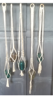 Load image into Gallery viewer, Macramé hanger with antique glass insulator. Natural color macramé rope with wooden ring hanger. Each one is unique! They are all approximately 3ft long.
