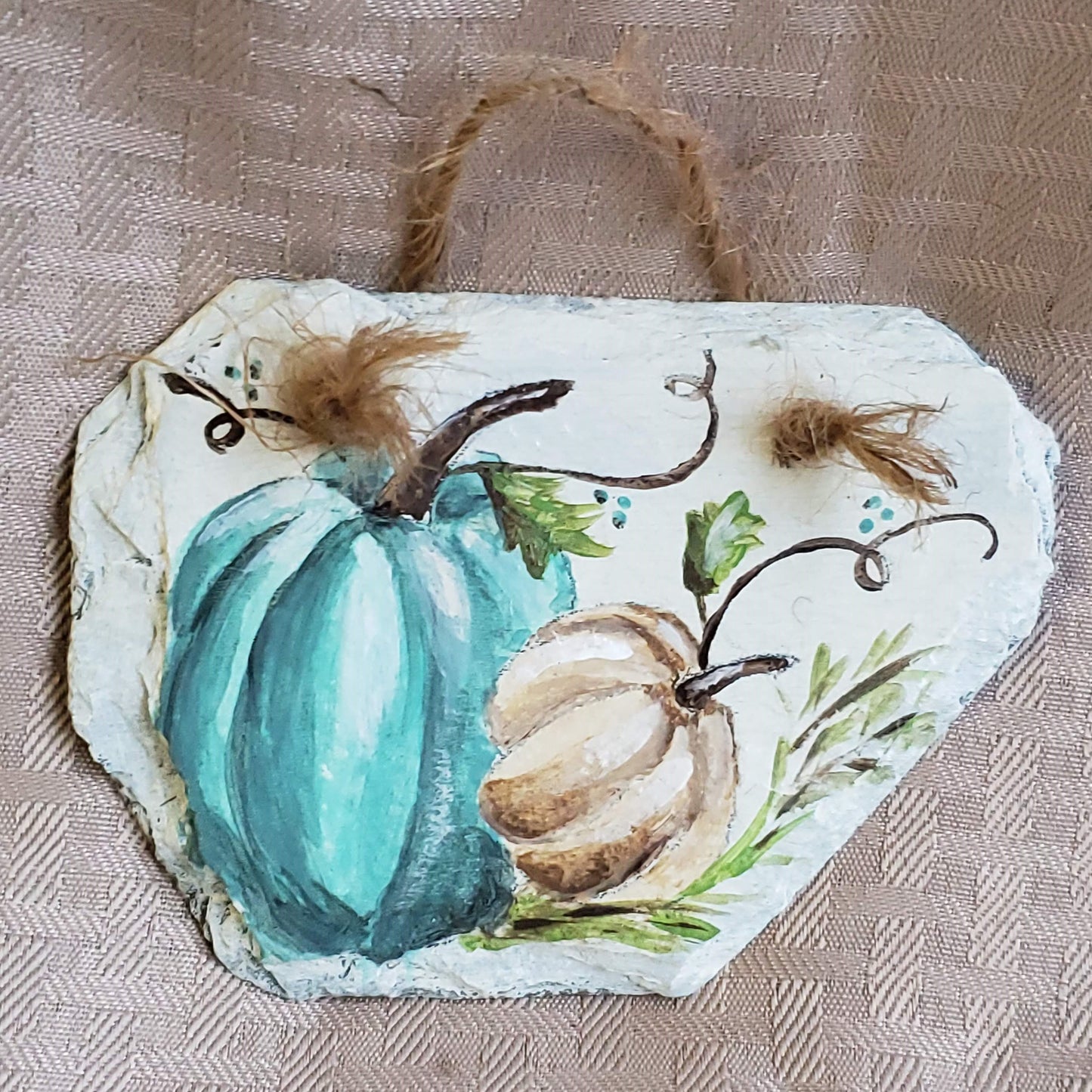 A wondrously petite slate sign, this little cutie can add some fall flair to virtually any space. hand-painted white with blue and white pumpkins adorably small size 4.5" x 3.5" jute rope hanger